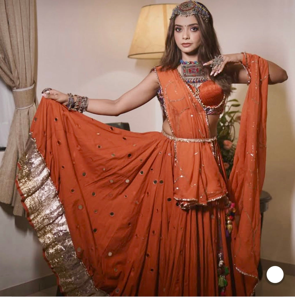 Pooja Kalyani Rust Lehenga Set