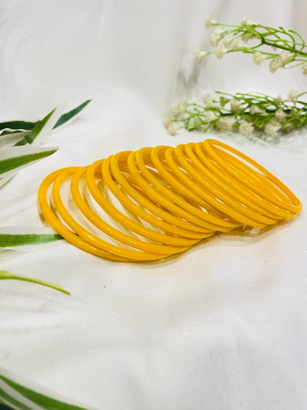 Yellow glass bangles