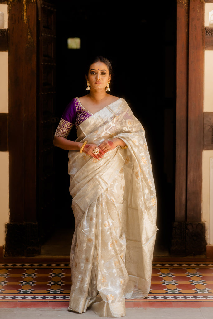 Andhra handloom weaver unveils saree woven with gold, silver